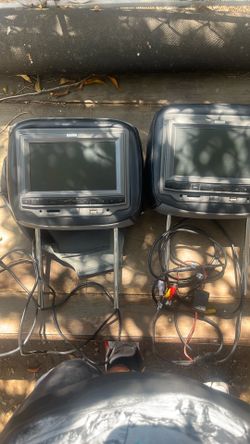 Head rest with dvd player