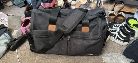 Diaper bag with changing pad