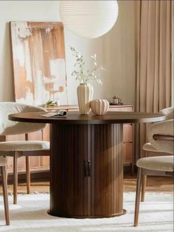 Round Dark Wood Dining Table with Storage Base
