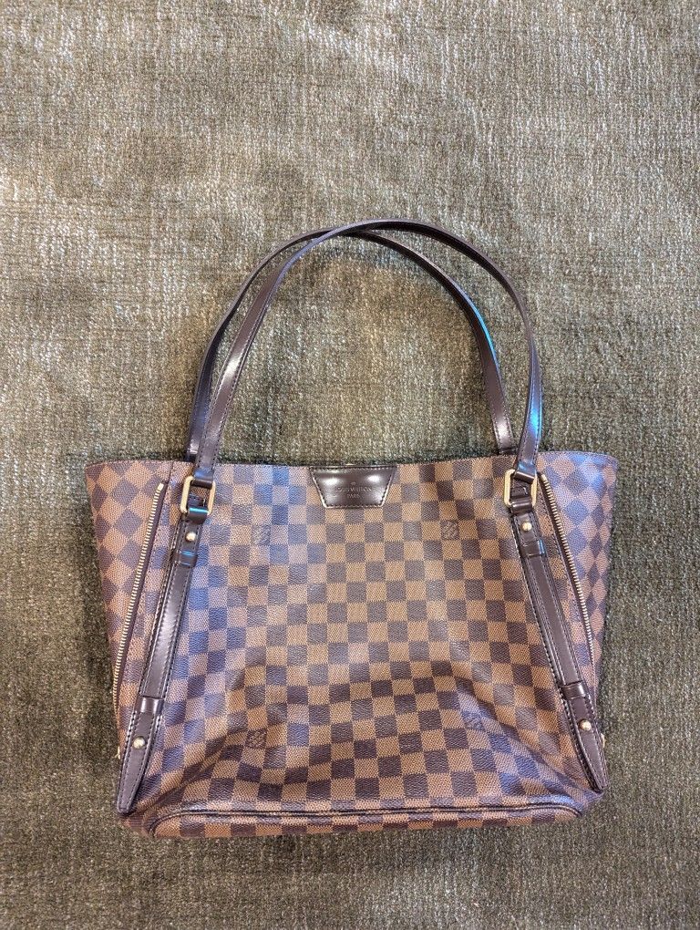 Louis Vuitton With Side Expanding Zippers