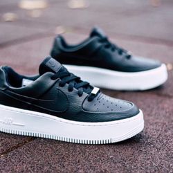 Women’s Nike Air Force one black leather tennis shoe size 9
