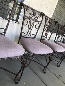 6 steel framed chairs with cushions. All in great condition. $7 each or $30 for all