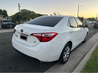 2016 Toyota Corolla LE White Sedan