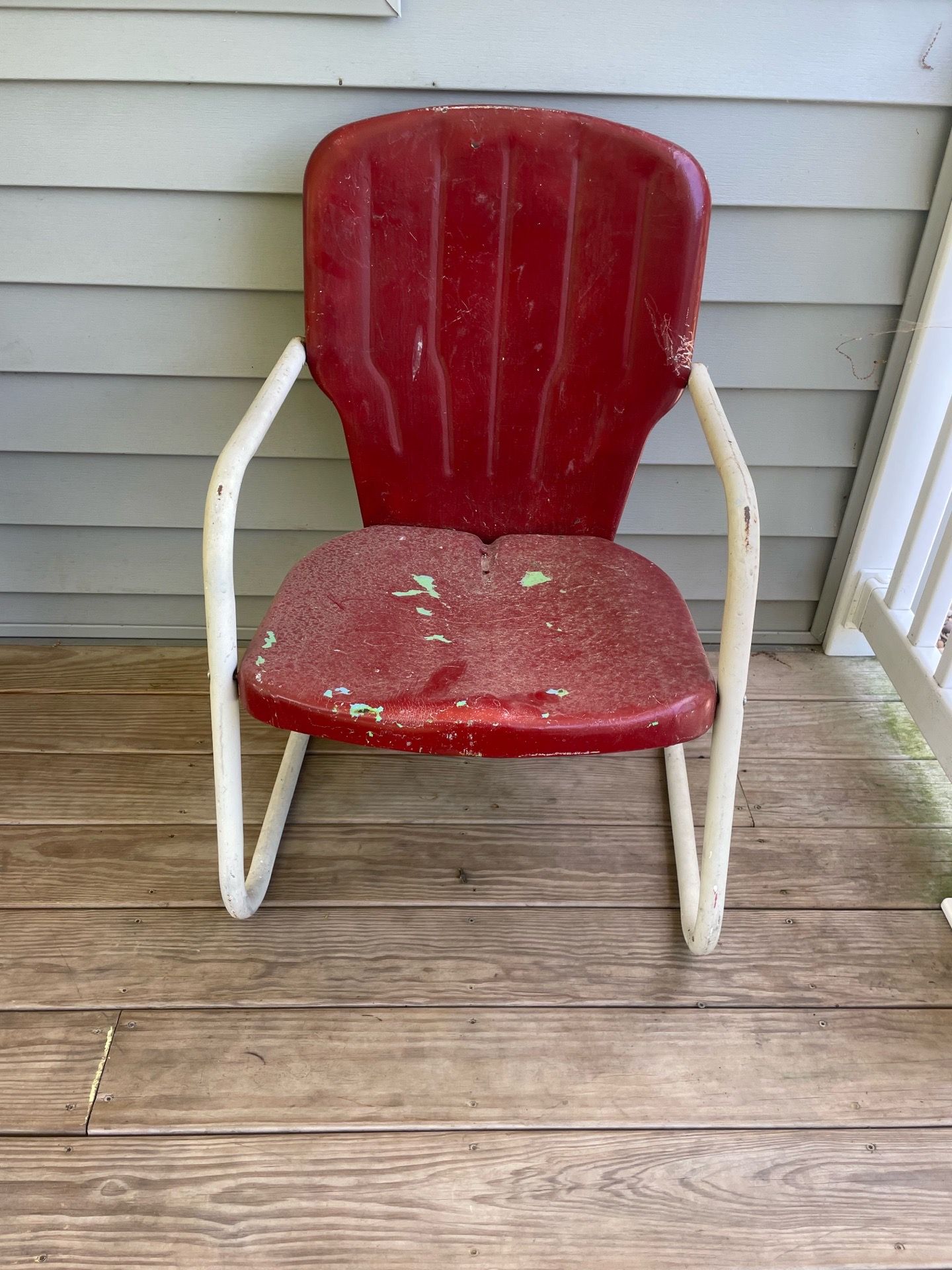 Old metal antique chair in good condition could use a paint job :)