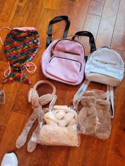 Nice bags and nernaid sling. 2 bunny earmuff with jumping ears, gloves