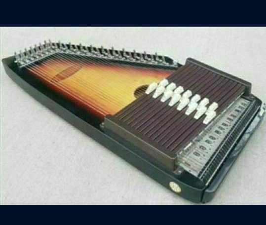 SEKOVA CHROMAHARP 15-CHORD AUTOHARP SUNBURST -
AUTOHARP Instrument : Includes Tuner & Original Case
Excellent Condition Nice!
