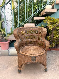 Comfy wicker chair with arms