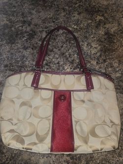 Coach burgundy purse with gold hardware