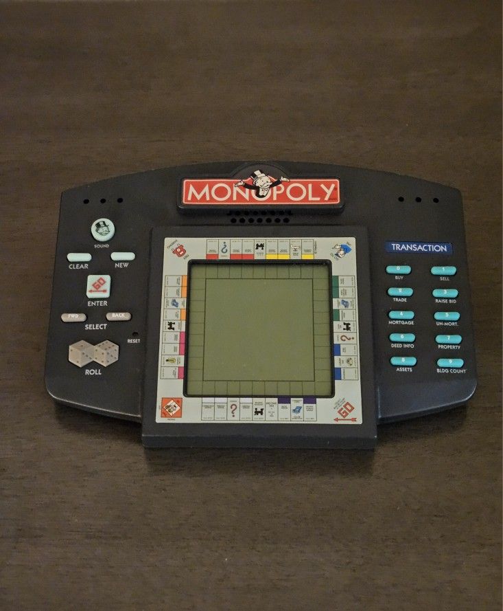 Monopoly Handheld Electronic Game Video Board Game