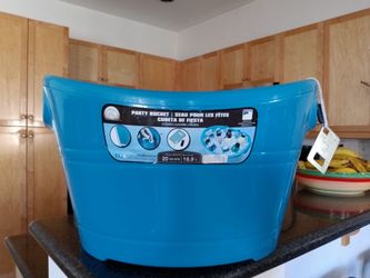 Party cooler with bottle opener and drain