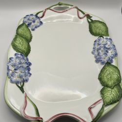 Vietri hand-painted blue hydrangea and green leaf design  pink ribbon accents