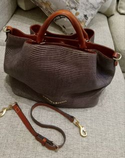 This is a Dooney & Bourke Embossed Lizard XLarge Barlow Bag. 
