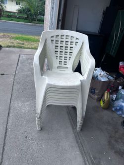 Set of 8 white plastic stacking chairs