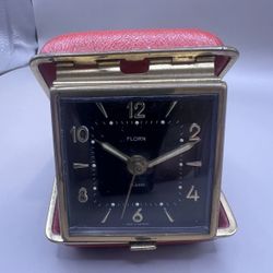 florn travel alarm clock. Vintage 1960 . Made In Germany. Black Dial. Works. Uh