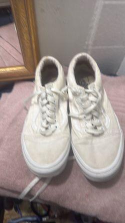 White Vans size 9 1/2 in women’s size.