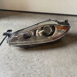 2011 XJL Front Driver Side Head Light Housing 