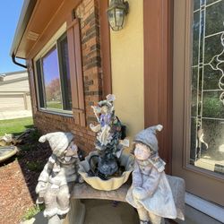 Very Beautiful statues 2 End the bench with the fountain