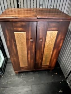 Wooden bar with copper accents