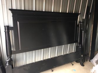 Antique four poster stained black bedframe. Must go this week