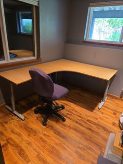 Desk and adjustable swivel chair