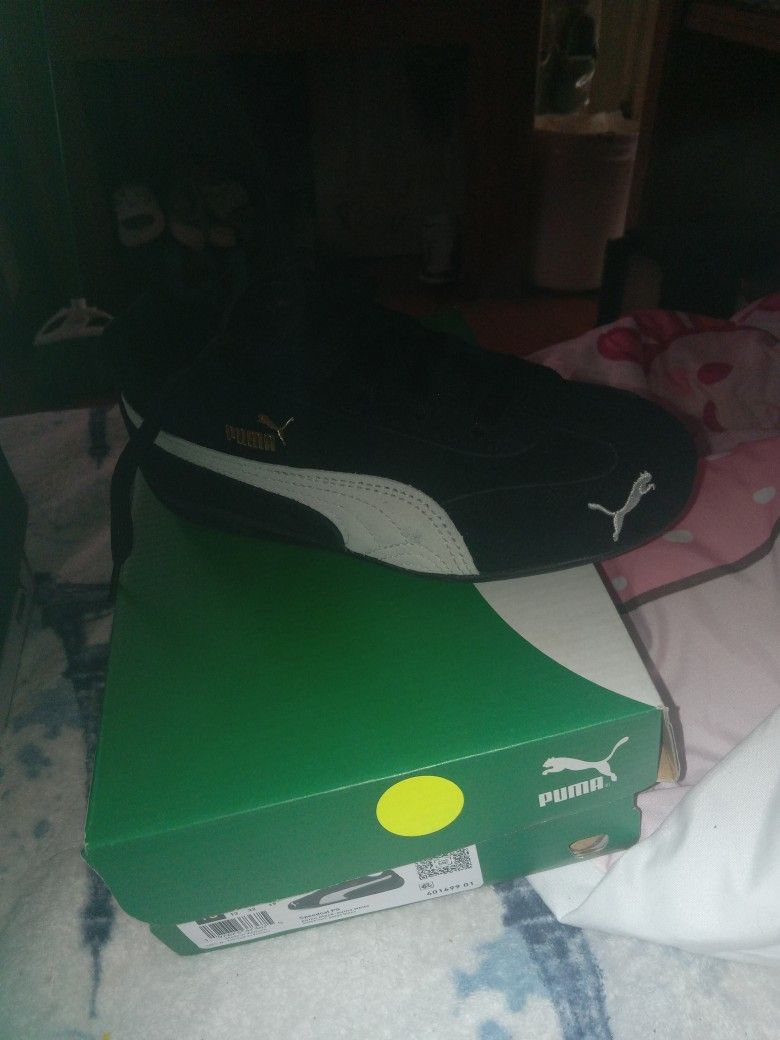 Pair Of Lil Boys Pumas And A Pair Of Lil Girls Pumas