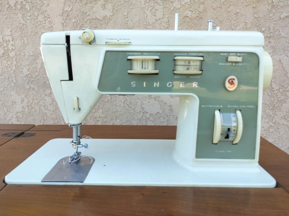 $50. Singer Sewing Machine Model 734 & Table