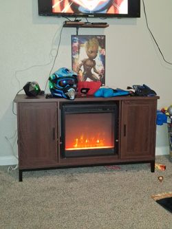 Tv entertainment with fireplace