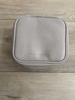Poppies and peonies tech case.  Dimensions: 5.5” L x 5.5” H x 2.5" W. Brand new, no tags.  Cash only.    No electronic payments or trades.    No deliv
