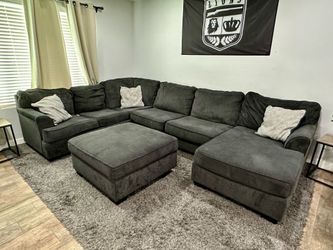 Living Spaces Gray Micro Fiber Sectional With Ottoman