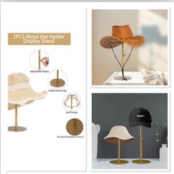 2 Pack adjustable height metal hat display stand with a gold finish. 
