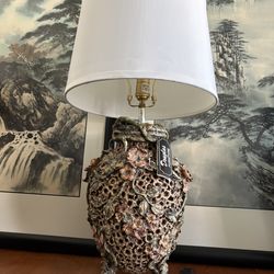 A table lamp with flowers and vines & with Douglas furniture tag