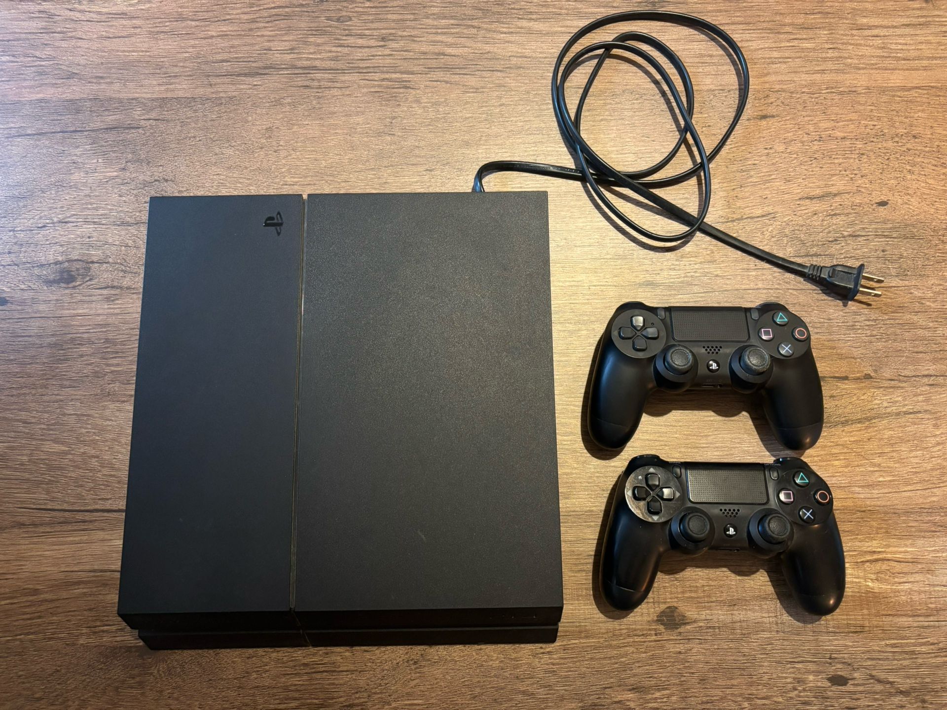 Sony PlayStation 4 (500 GB) Home Console - Black with 2 Dual Shock Controllers