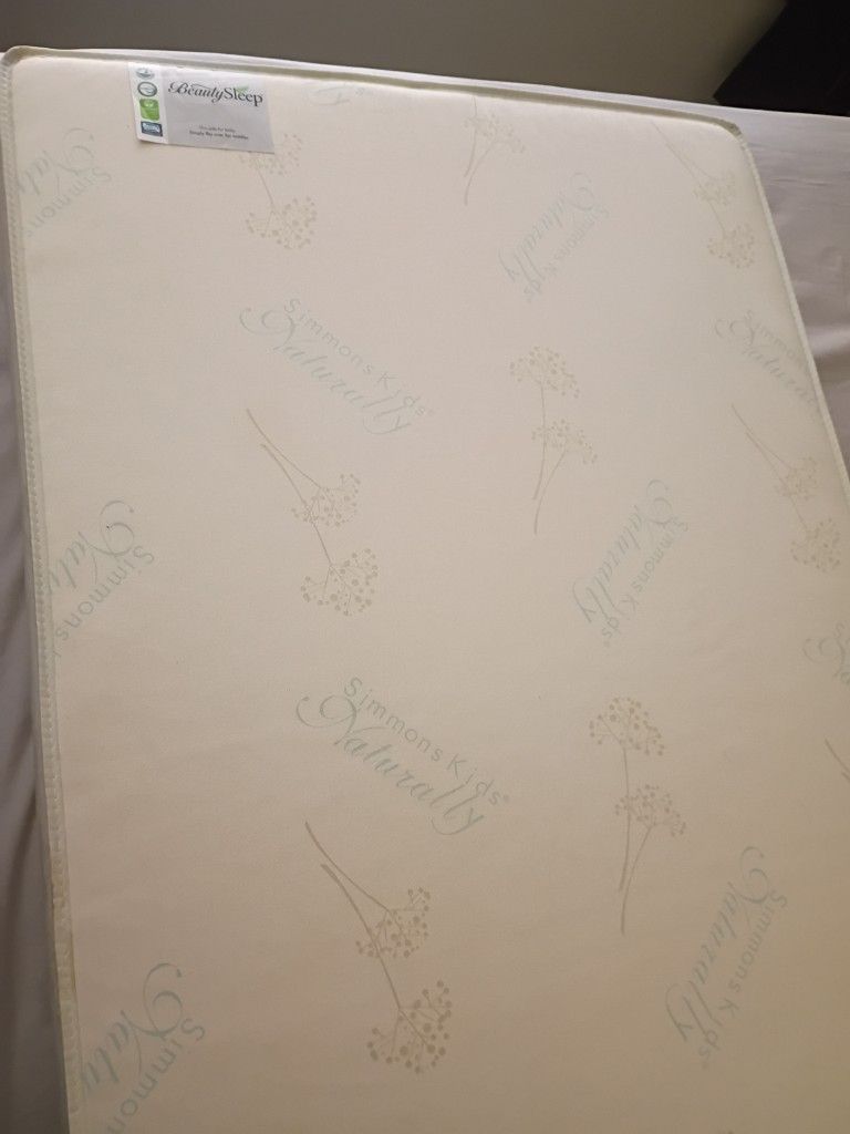 Simmons Kids crib mattress with baby side & toddler side
