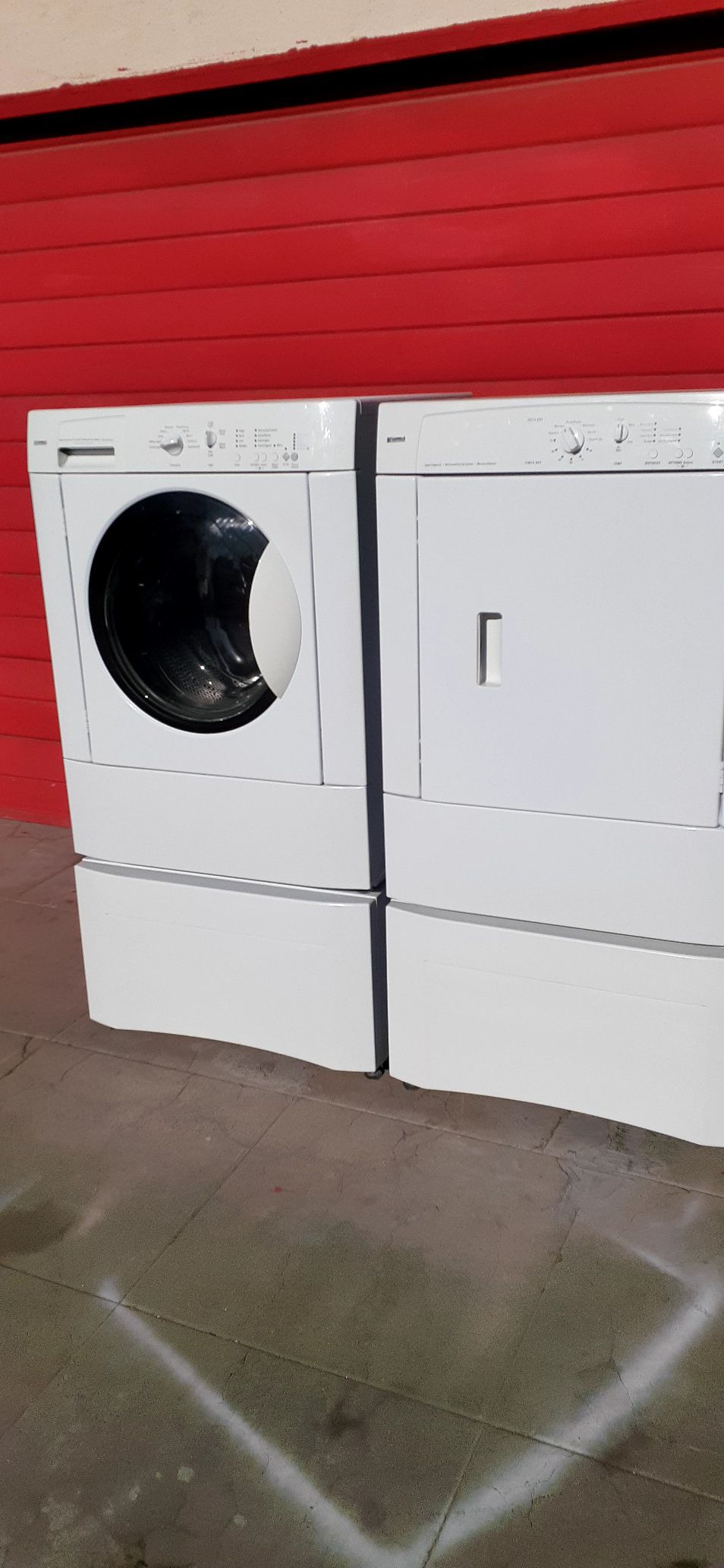 Kenmore front load washer and dryer with pedestals