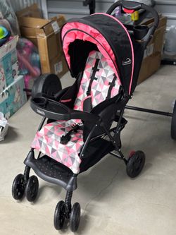Kolcraft stroller.