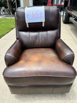 FREE  Swivel/rocker/recliner LEATHER