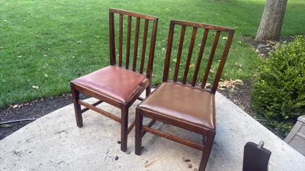 Two chairs - leather bottoms