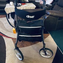       $125-Foldable senior Walking apparatus with Seat and Four big Wheels- (well loved as you can see as it has some discoloration from use on back b