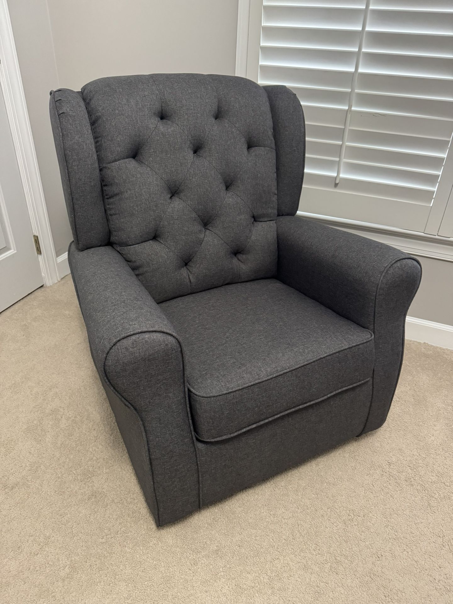 Gray swivel rocker chair