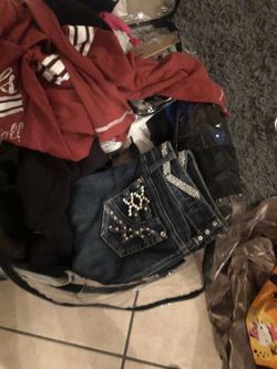 Bag full of clothes and other items