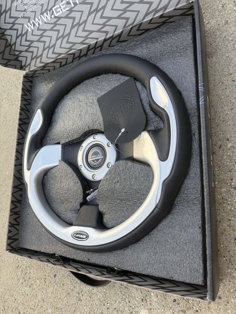 NRG Steering Wheel 320mm Sport Steering Wheel with Black Leather Silver Molded Trim