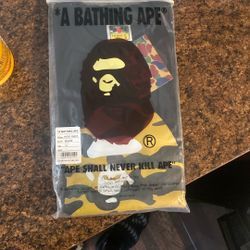 LARGE/ A BATHING APE NEVER OPENED STILL SEALED IN PLASTIC