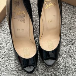 Christian Louboutin (red Bottoms ) 