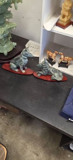 Antique estate sales Jade dog sculptures.