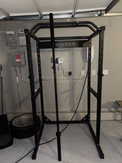 Squat Rack and Olympic Bar