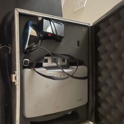 vintage Polaroid Land Camera Model 220 housed in a fitted hard case with accessories. 