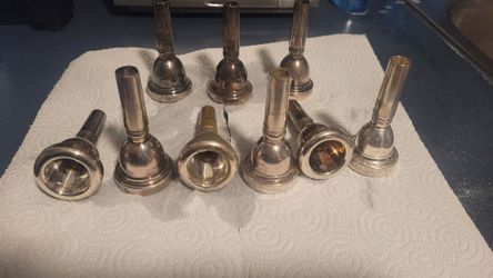 9 used large bore trombone mouthpieces ($30 each)