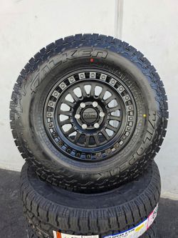 17" KMC w/ 33" Falken Wildpeak AT4W tires