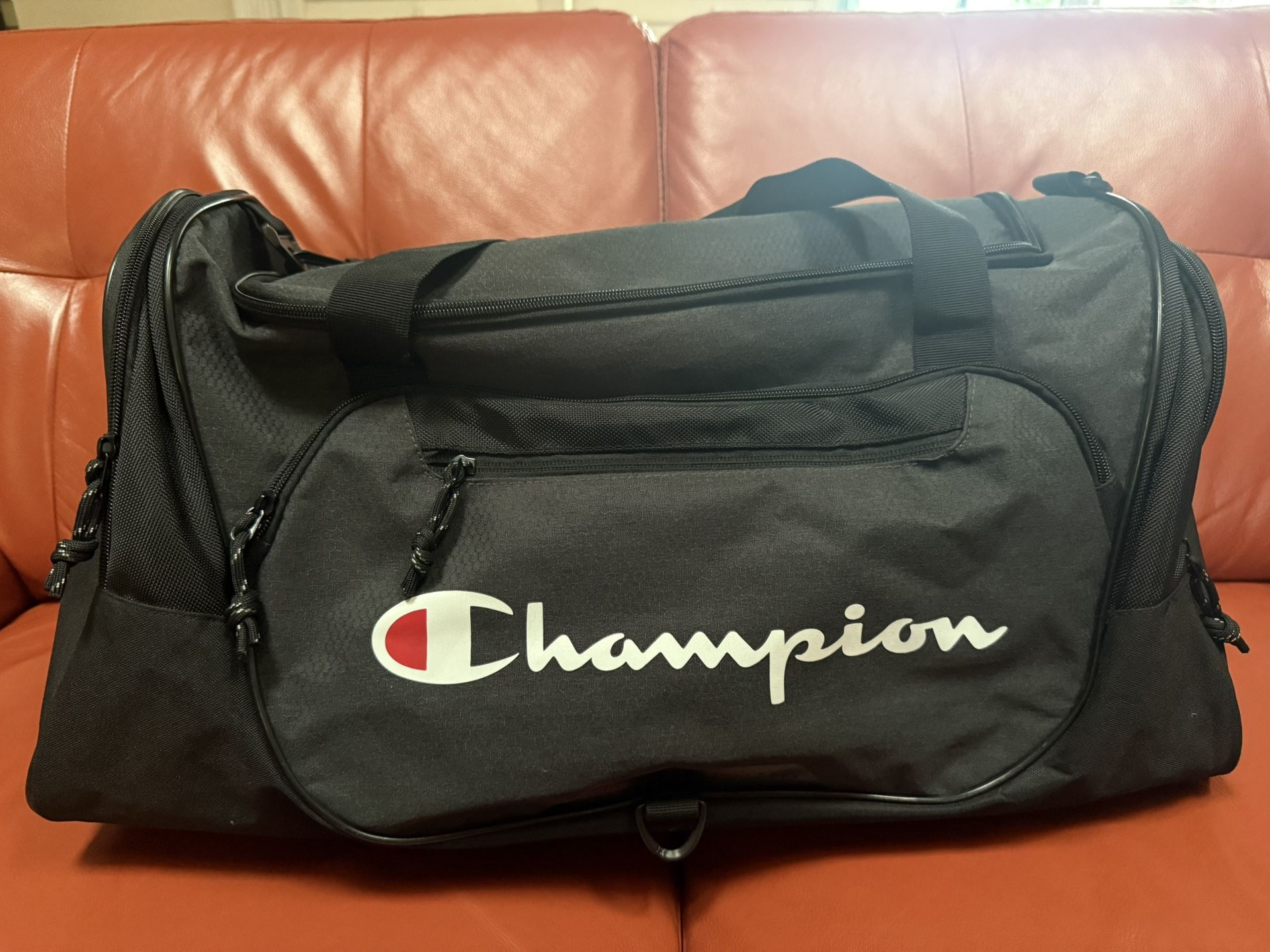 *Brand New* Champion Duffel - Travel - Gym Bag Suitcase Luggage. 23 in long 11 in tall.