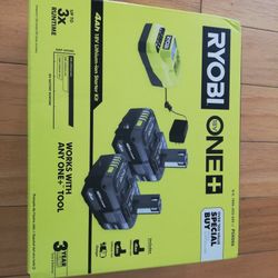 Two 4 Ah 18V Ryobi Batteries Plus Charger, New